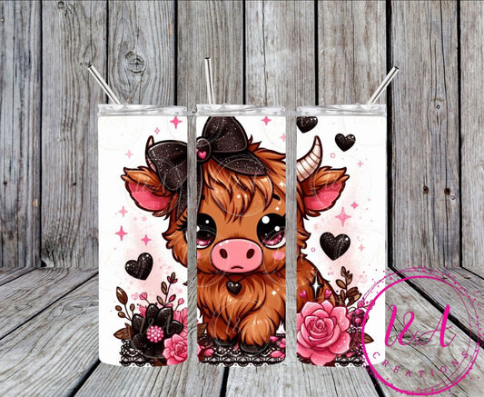 Highland cow with pink and black flowers