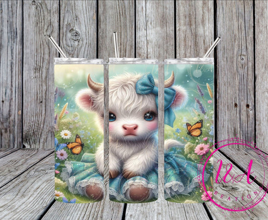 Highland cow with blue dress